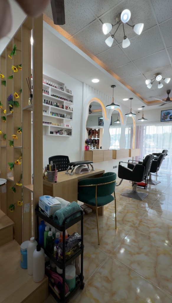 Main salon styling area with mirrors and chairs